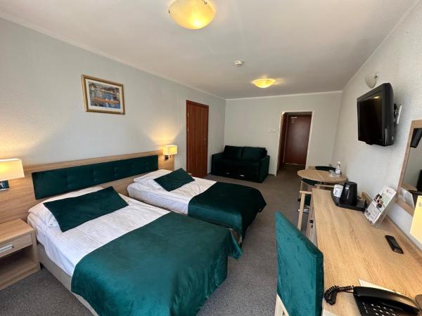 Hotel ***NAT Świnoujście : photo 1 de la chambre chambre triple