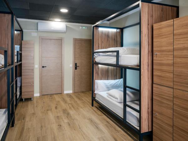 SOM Hostel By The Venue : photo 1 de la chambre lit dans dortoir mixte de 10 lits