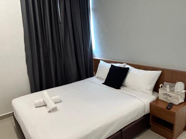 Pets and Family Guesthouse Kota Laksamana, Melaka : photo 6 de la chambre chambre lit queen-size