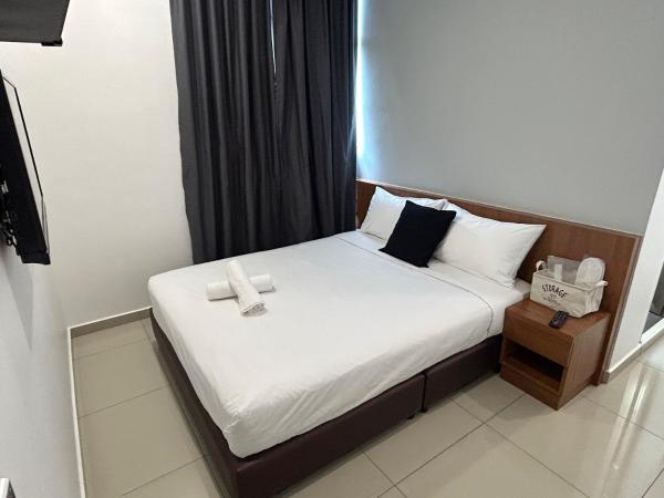 Pets and Family Guesthouse Kota Laksamana, Melaka : photo 5 de la chambre chambre lit queen-size