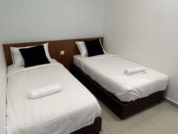 Pets and Family Guesthouse Kota Laksamana, Melaka : photo 3 de la chambre chambre lits jumeaux avec salle de bains