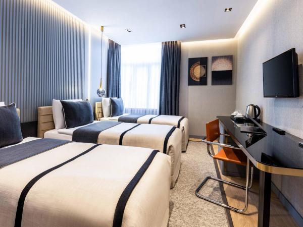Hotel Villa Zurich : photo 2 de la chambre chambre triple