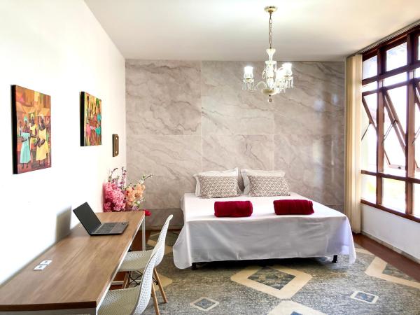 Éden Pampulha - Hotel Coworking : photo 5 de la chambre suite deluxe avec lit king-size