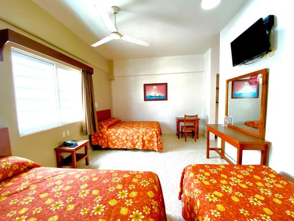 Hotel Delfines : photo 2 de la chambre chambre triple standard