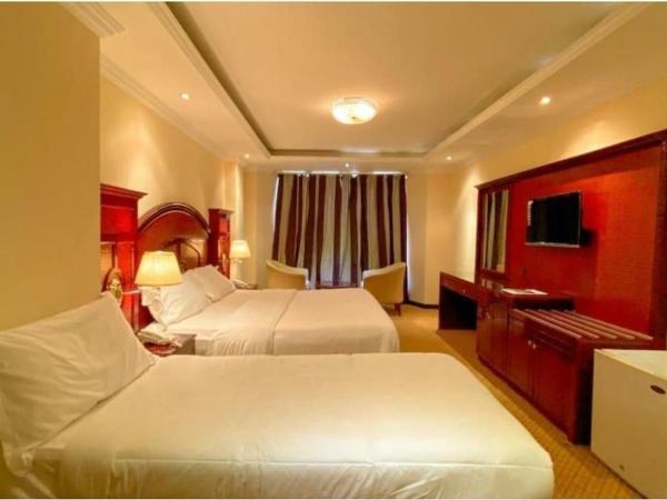 Regal Peninsula Hotel Formerly New Peninsula Hotel Ghubaiba Bus Station Bur Dubai : photo 1 de la chambre chambre triple de luxe