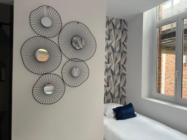 Hôtel Le Dormeur du Val : photo 1 de la chambre chambre lits jumeaux