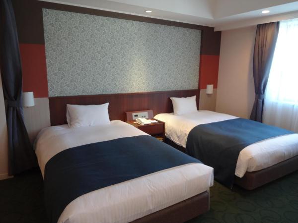 Kokusai 21 International Hotel : photo 7 de la chambre chambre lits jumeaux d'angle - non-fumeurs