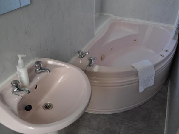 Cheers Hotel : photo 3 de la chambre chambre triple avec baignoire