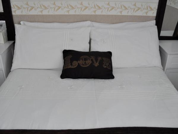 Cheers Hotel : photo 4 de la chambre chambre triple avec baignoire