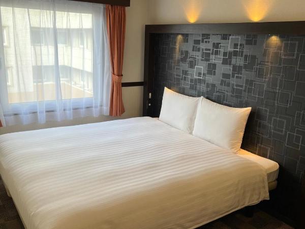 Toyoko Inn Tokyo Shinagawa Konan-guchi Tennozu Isle : photo 1 de la chambre chambre lit king-size - fumeurs