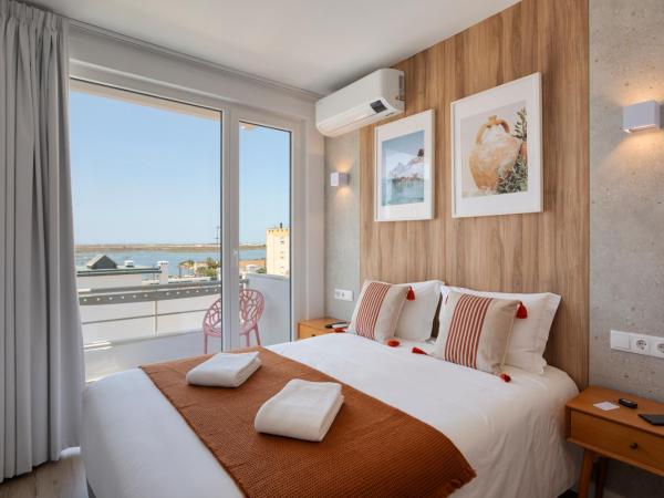 Hotel Made inn Faro : photo 8 de la chambre chambre familiale supérieure