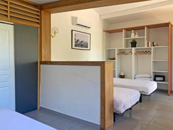 Hôtel Maora Village : photo 2 de la chambre chambre quadruple