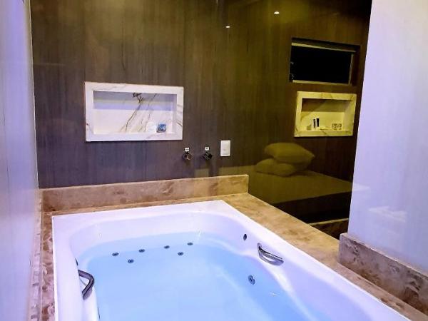 Motel Fantasy 3 (Adult Only) : photo 3 de la chambre suite lit queen-size avec baignoire spa