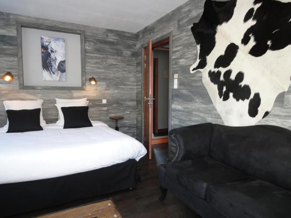 Les Loges Du Parc : photo 1 de la chambre suite junior avec bain à remous - vue sur lac