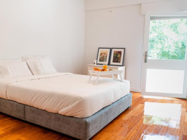 Seaside Elegance and Tranquility: Your Luxurious Porto Getaway : photo 1 de la chambre chambre double deluxe avec balcon