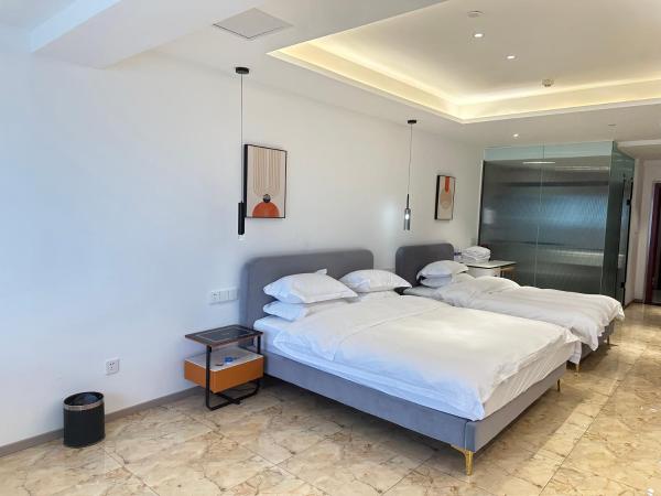 Chongqing Ouranjian Lake View Guesthouse : photo 9 de la chambre chambre lits jumeaux avec vue