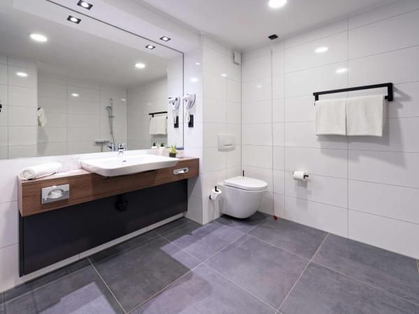 ATLANTIC Hotel Landgut Horn : photo 3 de la chambre deluxe room / double bed and sofa bed