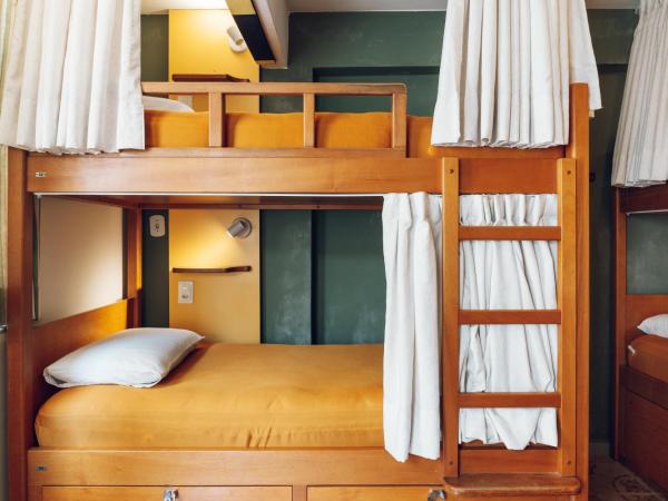 Discovery Hostel : photo 7 de la chambre lit simple dans dortoir mixte de 6 lits