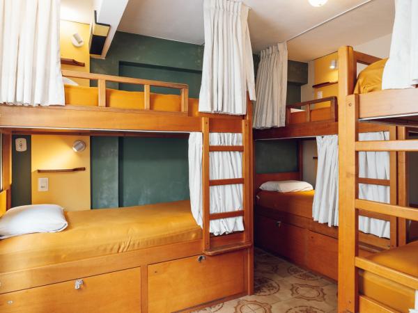 Discovery Hostel : photo 5 de la chambre lit simple dans dortoir mixte de 6 lits