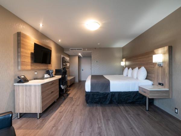 Hôtel & Suites Le Dauphin Québec : photo 3 de la chambre chambre lit king-size