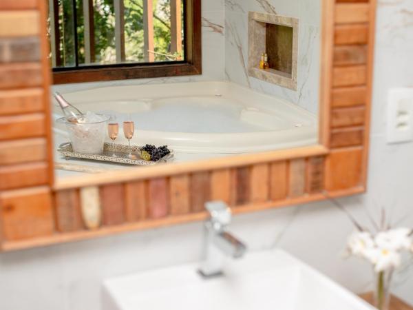 Villa Bella Ferradura : photo 1 de la chambre chambre double deluxe avec baignoire