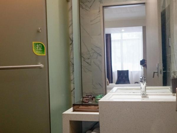 Paco Hotel Tianhe Coach Terminal Metro Guangzhou : photo 1 de la chambre chambre lit queen-size deluxe