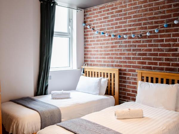 The Nest Boutique Hostel : photo 2 de la chambre chambre lits jumeaux