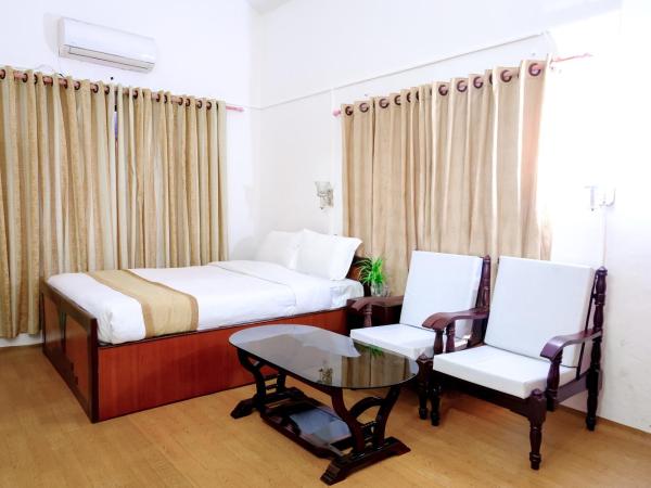 Happy Days Inn : photo 1 de la chambre chambre lit king-size supérieure