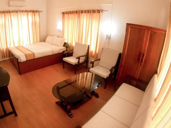 Happy Days Inn : photo 2 de la chambre chambre lit king-size supérieure