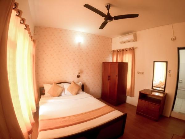 Happy Days Inn : photo 1 de la chambre chambre lit king-size deluxe