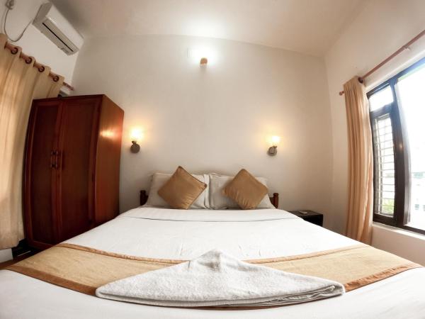 Happy Days Inn : photo 3 de la chambre chambre lit king-size standard