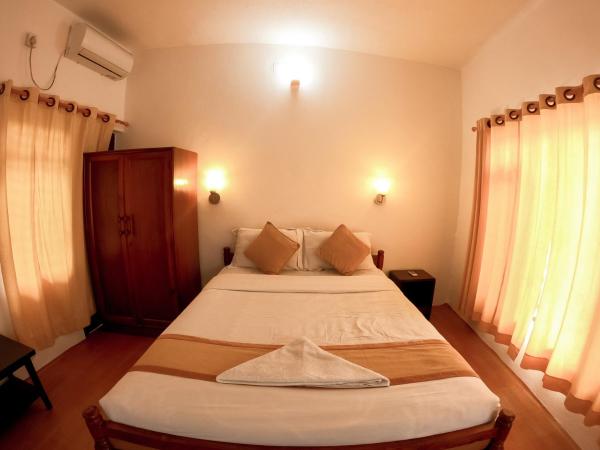 Happy Days Inn : photo 1 de la chambre chambre lit king-size standard