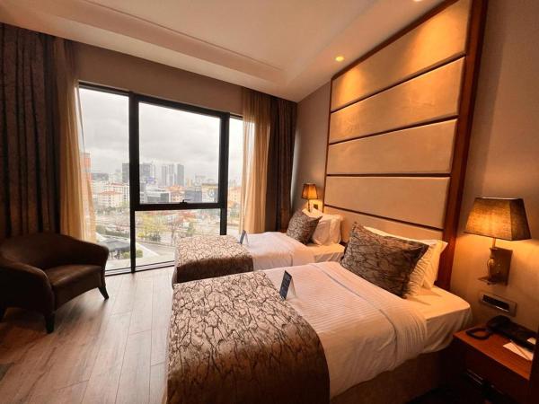 Days Hotel by Wyndham Istanbul Maltepe : photo 3 de la chambre single room with two single beds and sea view