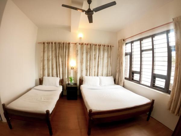 Happy Days Inn : photo 2 de la chambre chambre double ou lits jumeaux