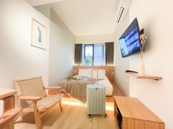Sleep Box Penang : photo 2 de la chambre  deluxe room with shared bathroom