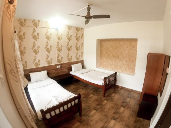 Happy Days Inn : photo 1 de la chambre chambre lits jumeaux