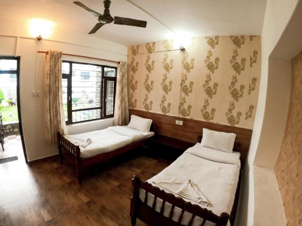 Happy Days Inn : photo 2 de la chambre chambre lits jumeaux