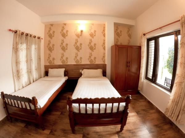 Happy Days Inn : photo 1 de la chambre chambre lits jumeaux