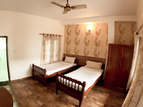 Happy Days Inn : photo 2 de la chambre chambre lits jumeaux