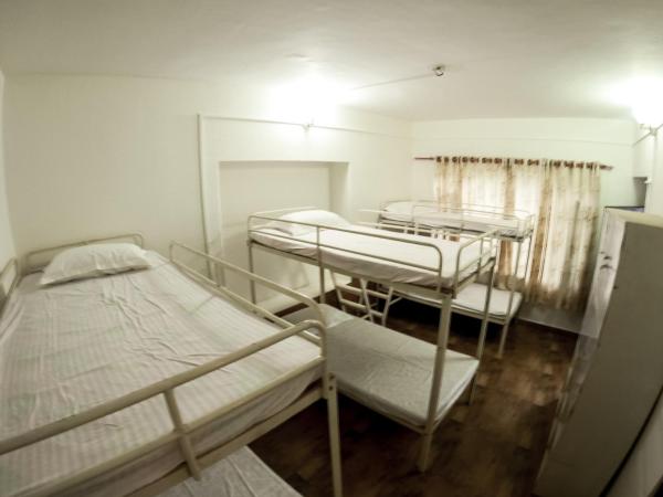 Happy Days Inn : photo 1 de la chambre lits superposés dans dortoir masculin