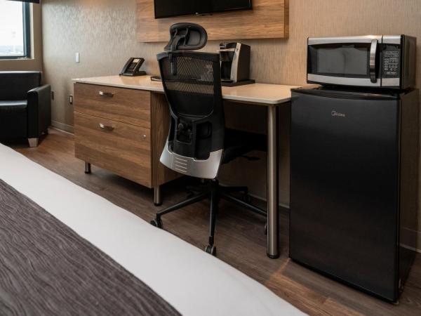 Hôtel & Suites Le Dauphin Québec : photo 7 de la chambre chambre lit king-size