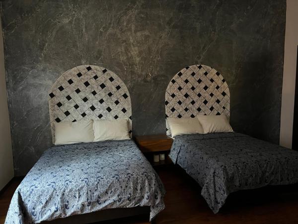 Catedral 304 : photo 8 de la chambre chambre deluxe avec 2 lits queen-size