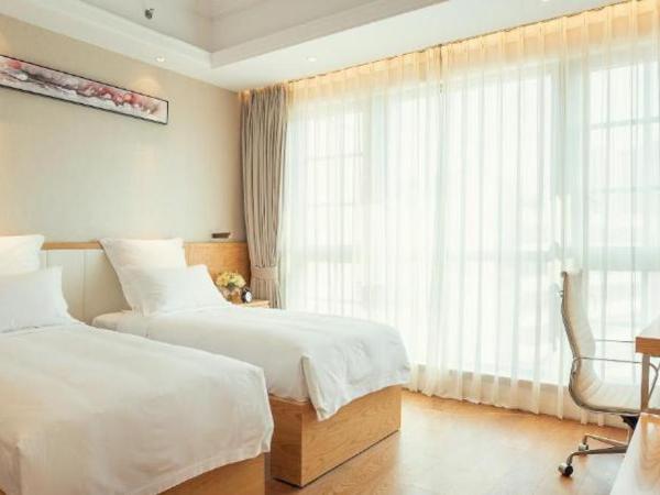 Residence G Nanshan : photo 2 de la chambre chambre double ou lits jumeaux avec douche