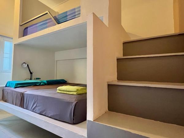 Beach Jungle : photo 2 de la chambre chambre triple avec salle de bains commune