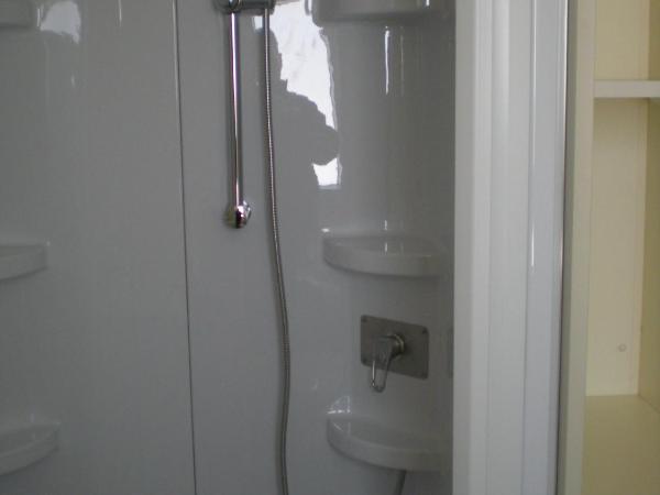 Naturist Mobile Homes Eden in FKK Ulika : photo 6 de la chambre studio avec patio et vue sur la mer