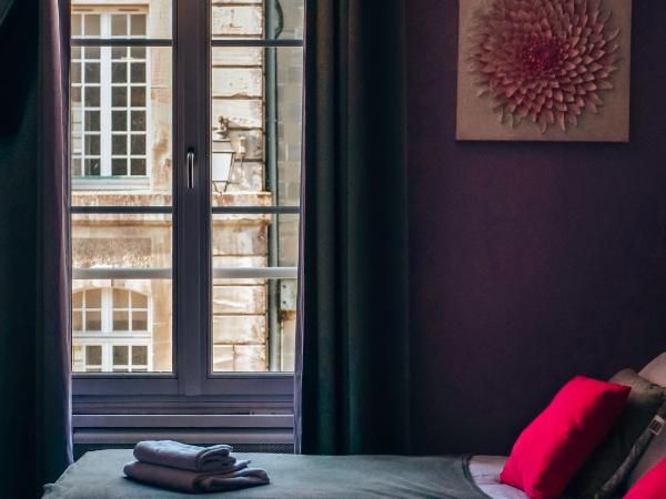 Hôtel Le Saint Patrice : photo 1 de la chambre petite chambre lits jumeaux