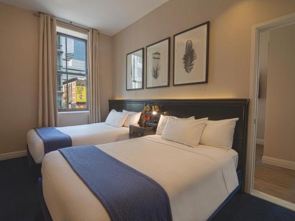 The Frederick Hotel Tribeca : photo 1 de la chambre suite tribeca avec 2 lits doubles et canapé-lit