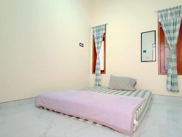 Surabaya Homey near UNAIR Syariah : photo 1 de la chambre chambre double standard avec ventilateur