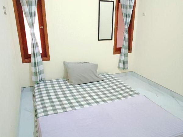 Surabaya Homey near UNAIR Syariah : photo 2 de la chambre chambre double standard avec ventilateur