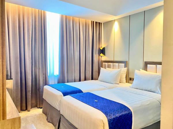 Arthama Tanah Abang Jakarta : photo 7 de la chambre chambre double ou lits jumeaux standard